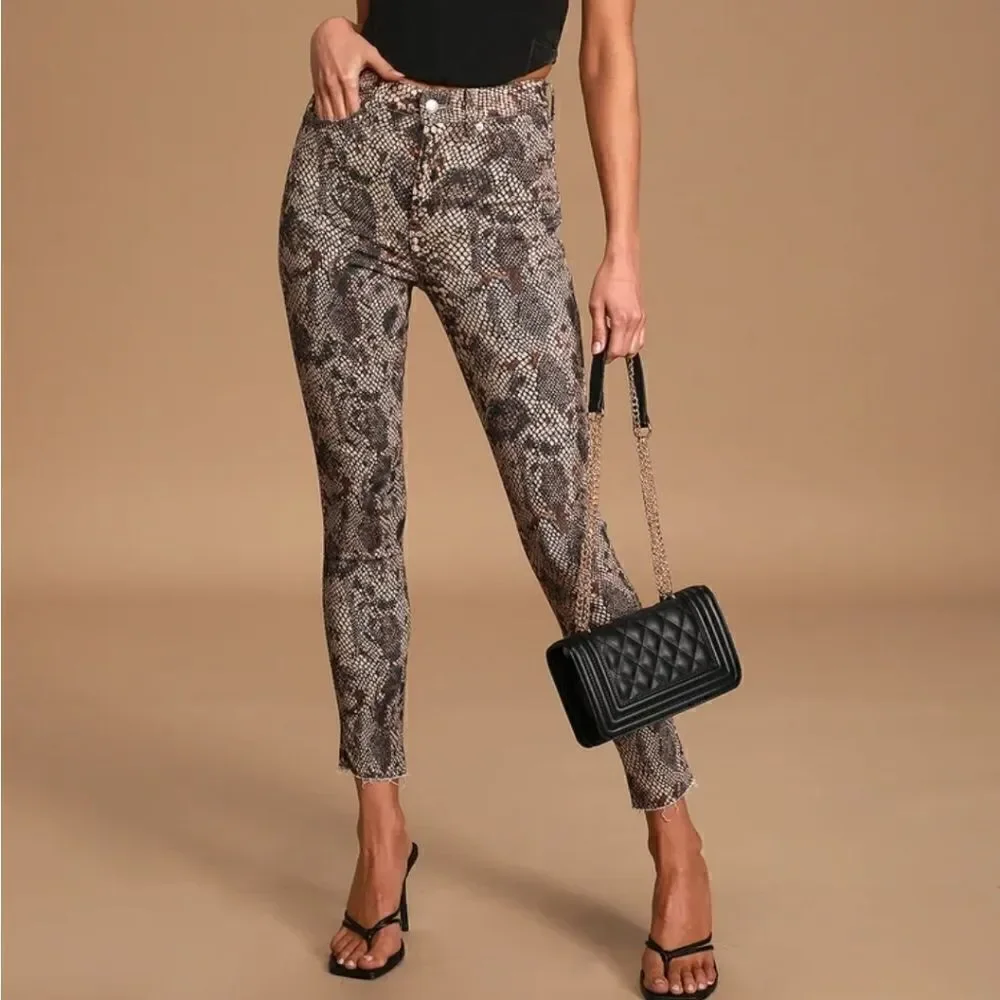 Free people raw high-rise snake print jeggings